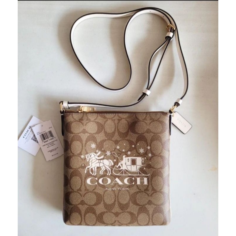 coach Mini Rowan File Bag In Signature Canvas With Horse And Sleigh