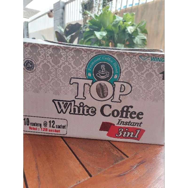 

Kopi Top white coffe 1 dus isi 10 renteng