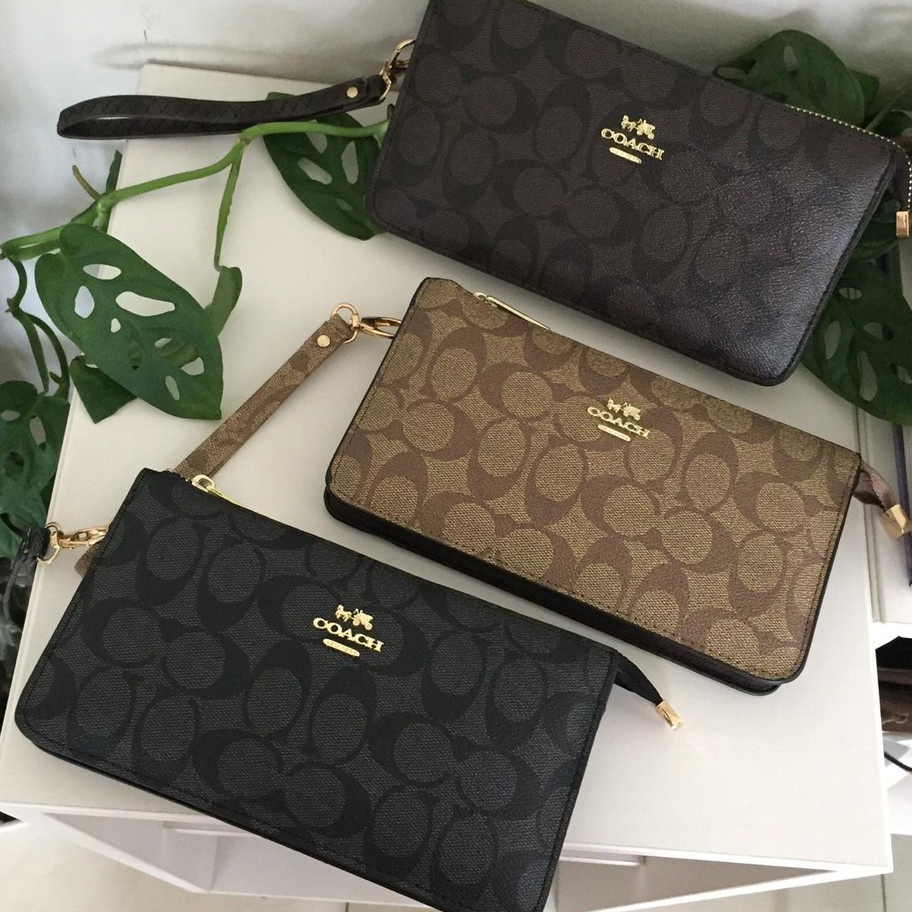 Dapatkan Harga Terbaik Sekarang Pouch Coach  dompet hp Coach signature