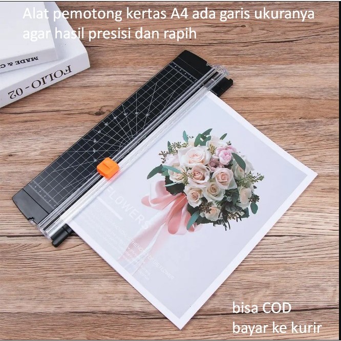 

Alat pemotong kertas A4 ada garis ukuranya agar hasil presisi dan rapih