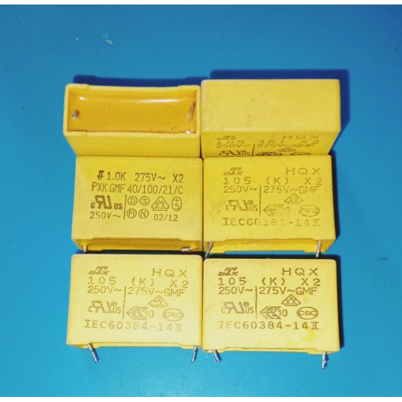 KAPASITOR 105 K 250V / 1.0K 275V~BEKAS