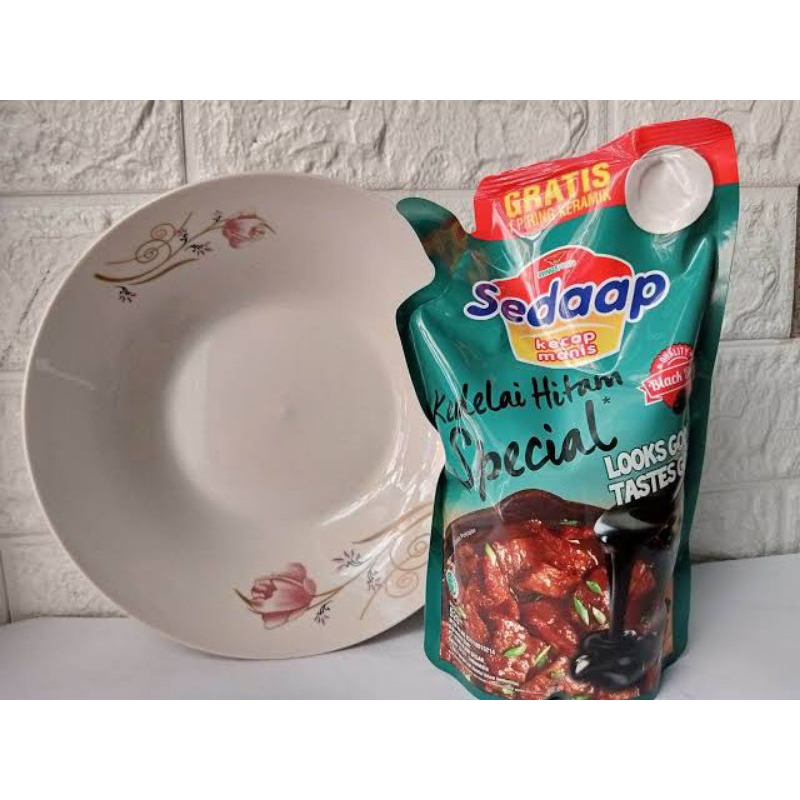 

Kecap Sedaap 520 Ml Premium Free piring.