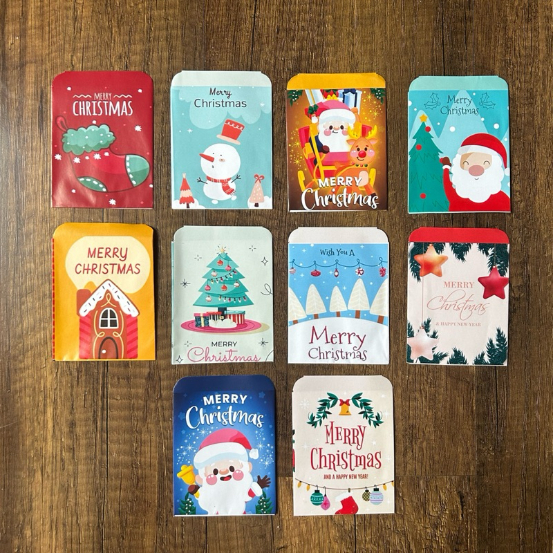 

AMPLOP MEDIUM / ANGPAO NATAL MERRY CHRISTMAS TAHUN BARU ISI 10 LEMBAR