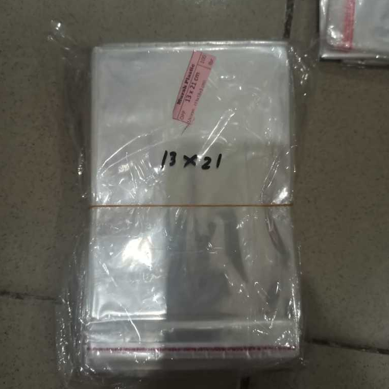 

13X21 CM PLASTIK OPP (SEAL/LEM) TEBAL 20 MIC ASLI / PLASTIK KEMASAN MAKANAN/SAMPUL BUKU