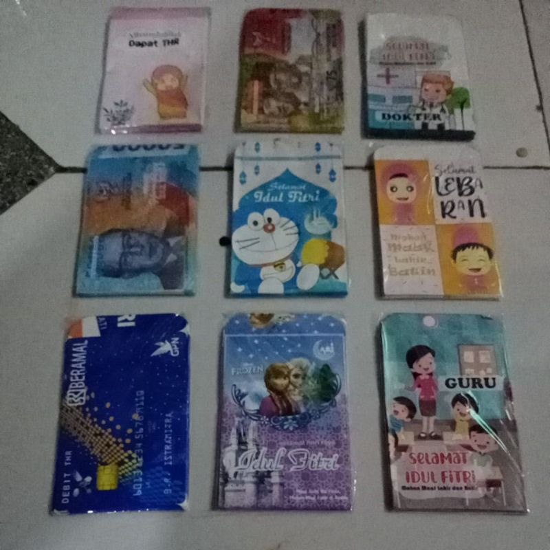 

ANGPAU LEBARAN MOTIF KARTUN PAKET 100PCS