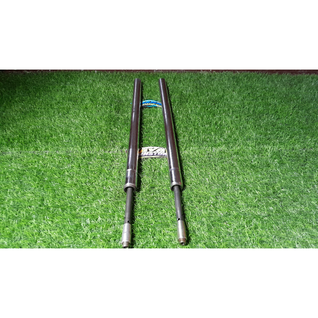 as linggisan skok shock depan megapro original set pir dan sulingan