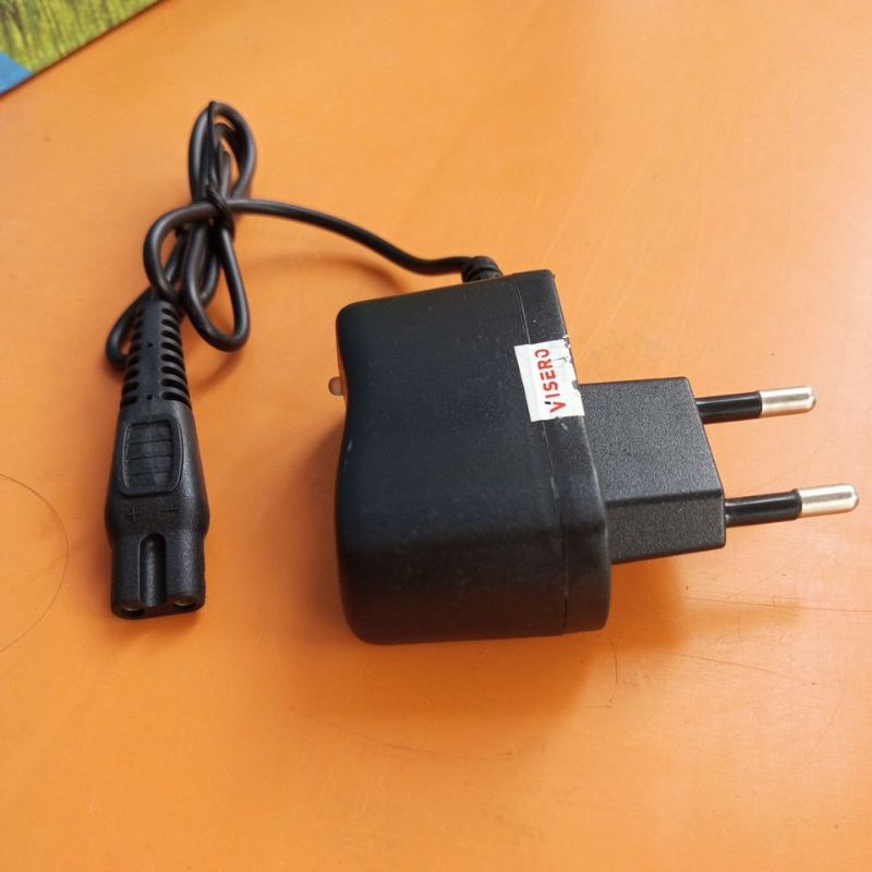 Charger senter Cas senter kepala 2 lubang kecil Jack berbentuk angka 8