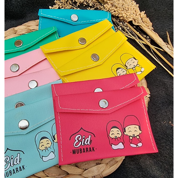 

ANGPAU AMPLOP LEBARAN KANCING DAN RESLETING isi 12pcs