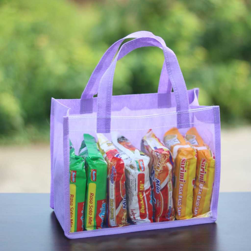 

Tas Spunbond P25xL13xT20 Mika Bening Transparan Souvenir Hampers Ulang Tahun Anak