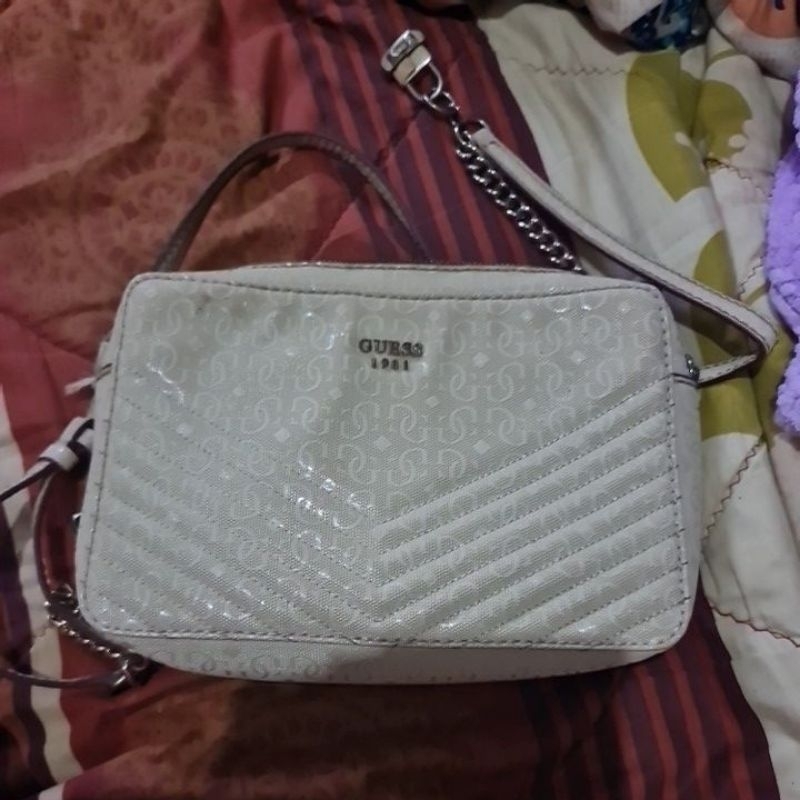 Guess sling mini bag sale preloved