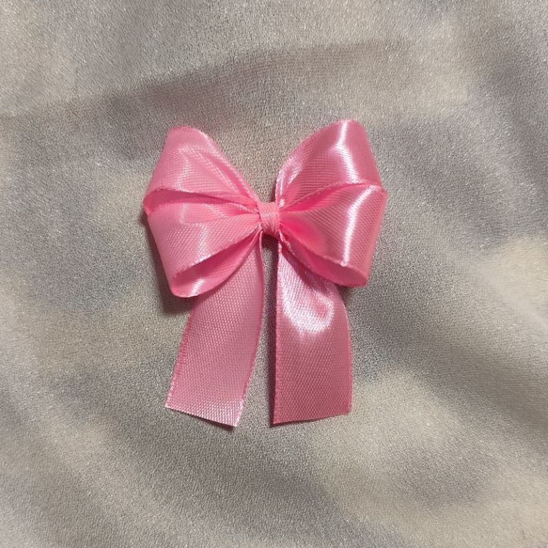 

Pita Satin lebar 2cm Warna Pink Muda. Minimal order 25pcs
