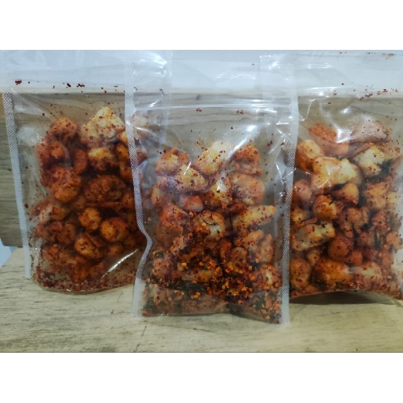 

Cemilan Seblak Kering Pedas Daun Jeruk Bahan Siomay mini dengan tektur renyah dan Nikmat. kemasan 100gr