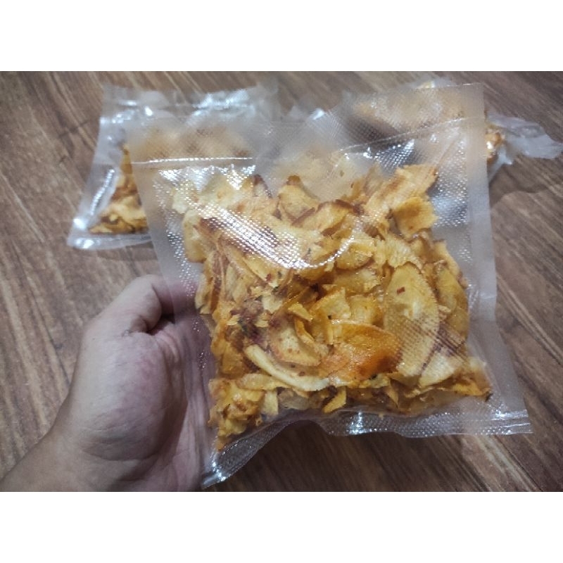 

Kripik Singkong Pedas Gurih, isi 100gr, kripik kriuk cocok untuk camilan (rasa kripik sate padang)