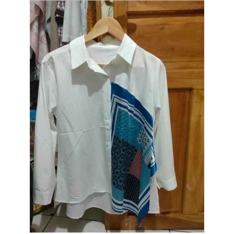 Blouse satin putih sold
