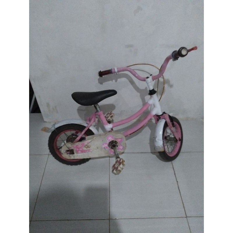sepeda anak perempuan bekas ( ukuran 12 )
