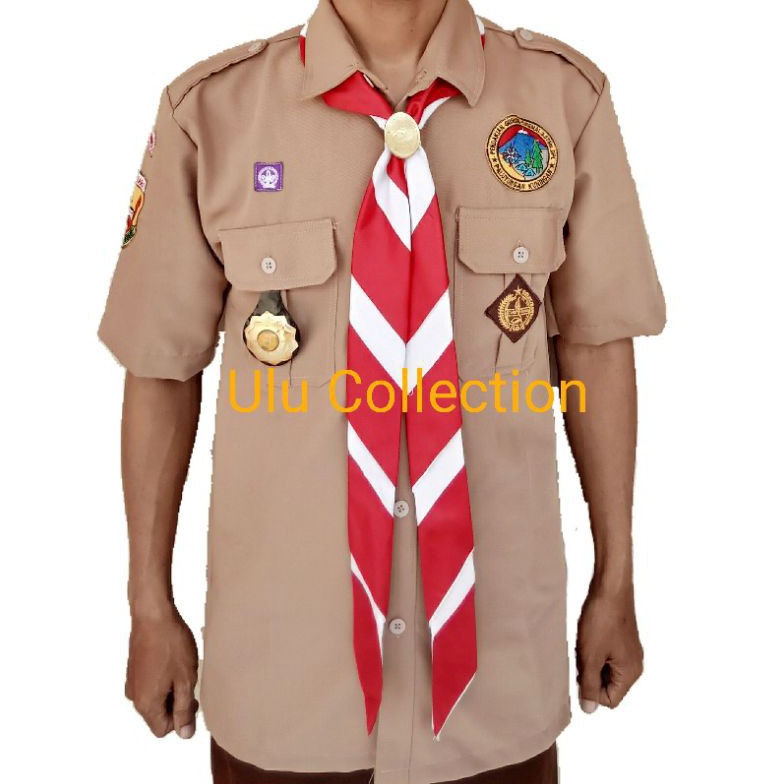 

KODE J6W4 Baju Pramuka Pembina Rapilo Larici Lengan Pendek Seragam Harian