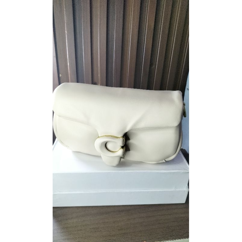 tas pillow coach