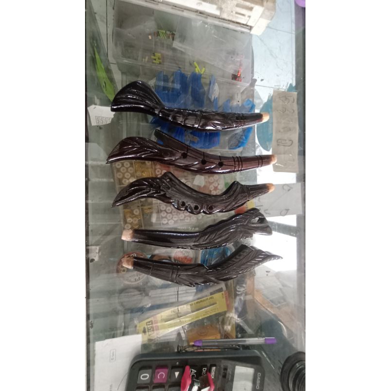 Gagang joran kayu ukir