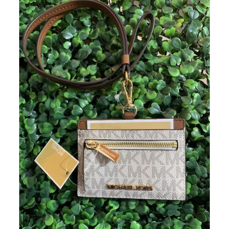 

michael kors jet set travel easwest lanyard vanilla,black, camel,primrose,brigt red Rp. 630.000