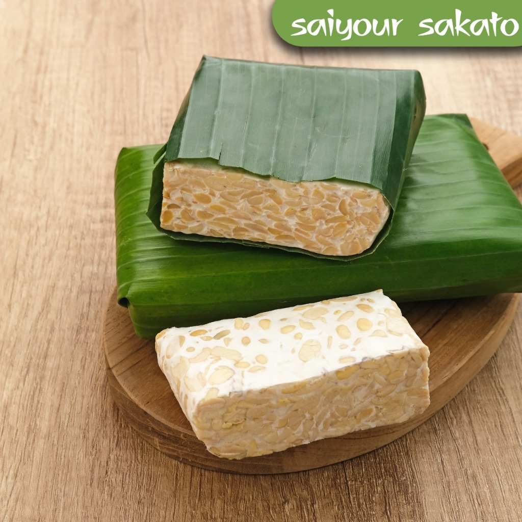 

Tempe Bungkus Daun 1 Potong - Saiyour Sakato