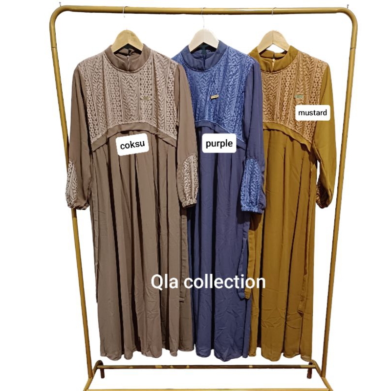 Gamis polos bahan ceruti.