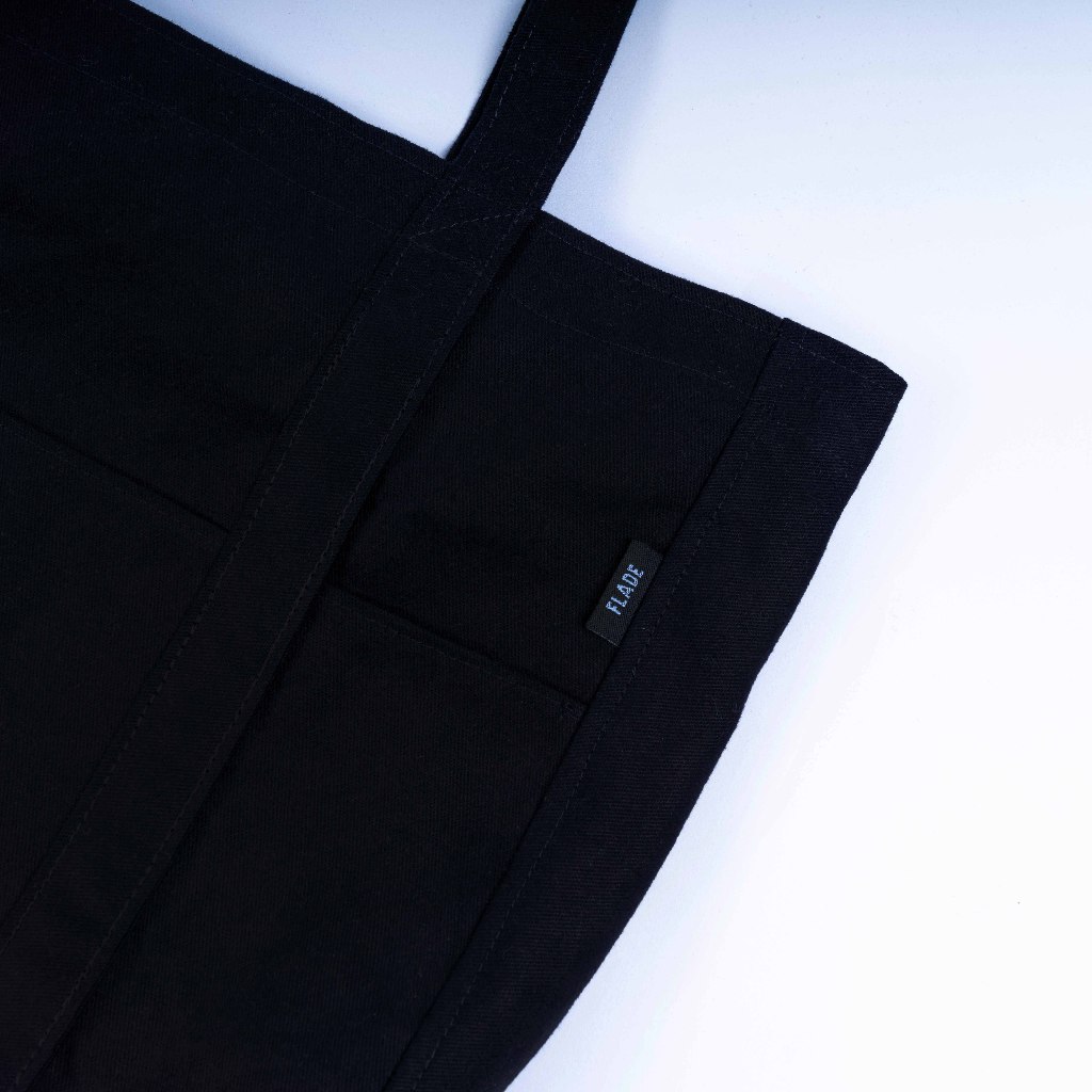 

ID FLADE STUDIOS TOTEBAG KANVAS BLACK RESLETING - TAS HITAM NONGKRONG KULIAH PRIA WANITA