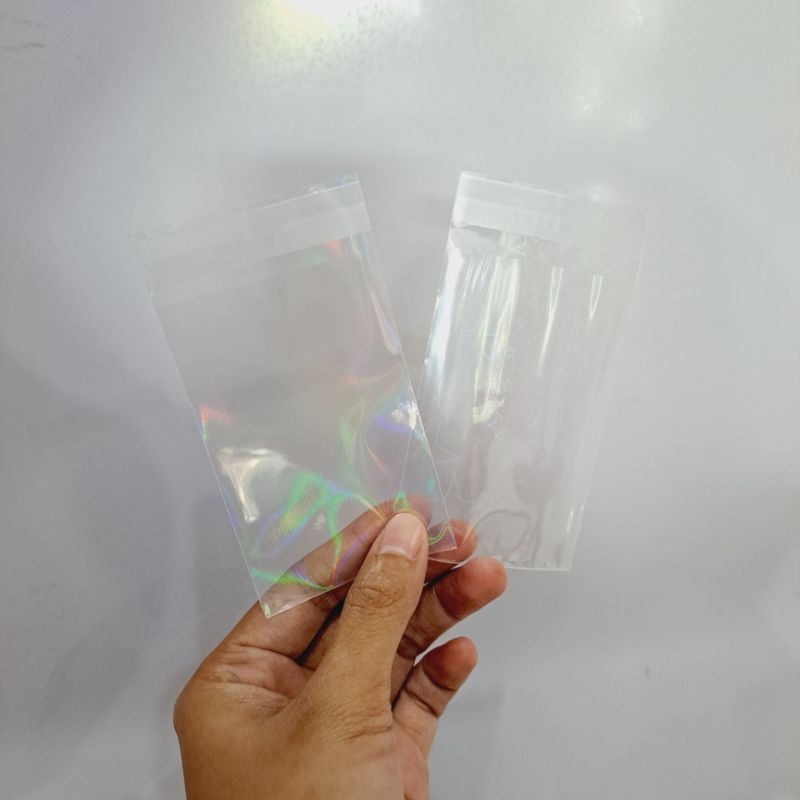 

Plastik Hologram Photocard 9x6 Satuan Polos Plastik Hologram Motif Bintang