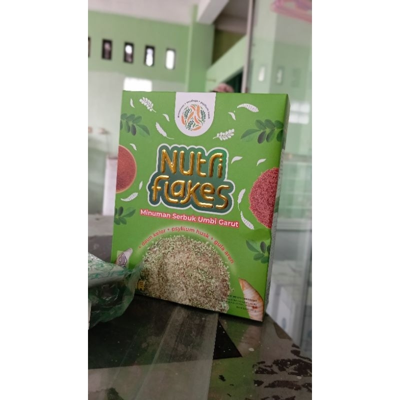 

NUTRIFLAKES Minuman serbuk ubi Garut dengan gula aren untuk Asam lambung dan maagh