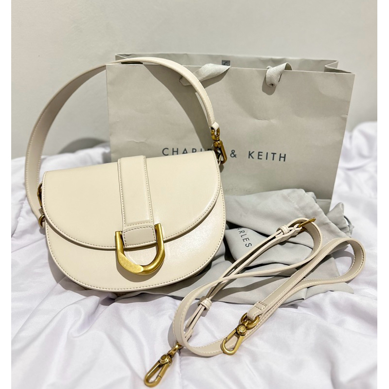 [PRELOVED] ORI CK Charles and Keith Gabine Saddle Bag - Cream