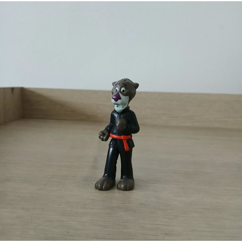 mainan figure singa Nestle