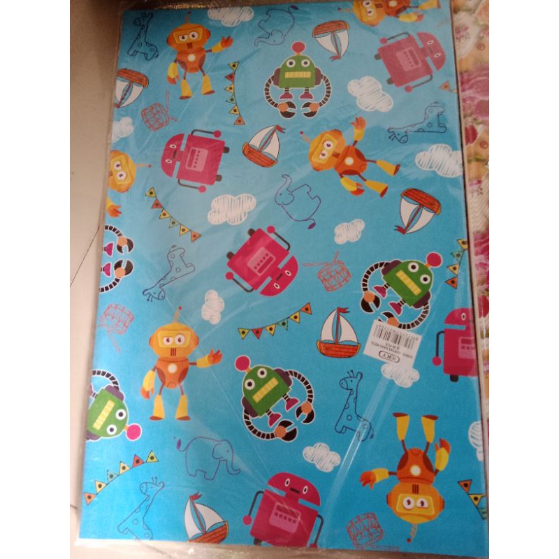 

kertas kado kiky motif boneka