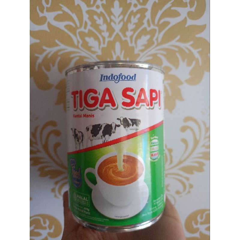 

Susu kental manis TIGA SAPI Indofood 490g kaleng susu kental manis