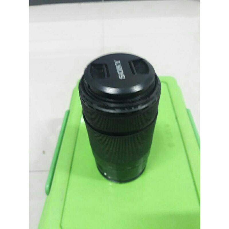 lensa tele sony 55 210 MINUS