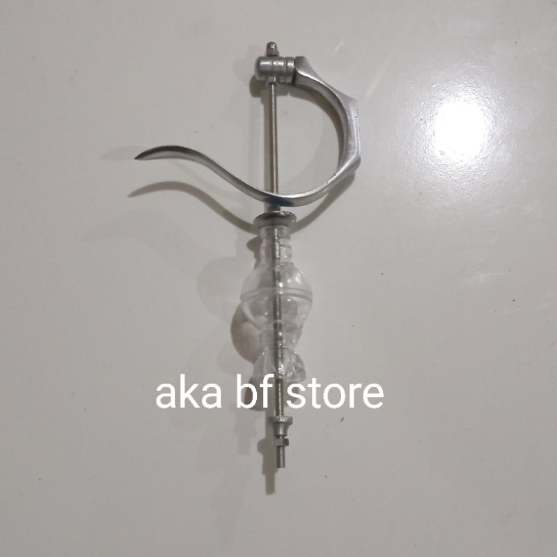 gantungan lipat dan pion bening sangkar kotak