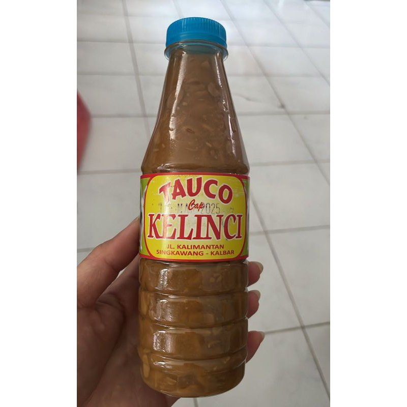 

taucho cap kelinci singkawang original