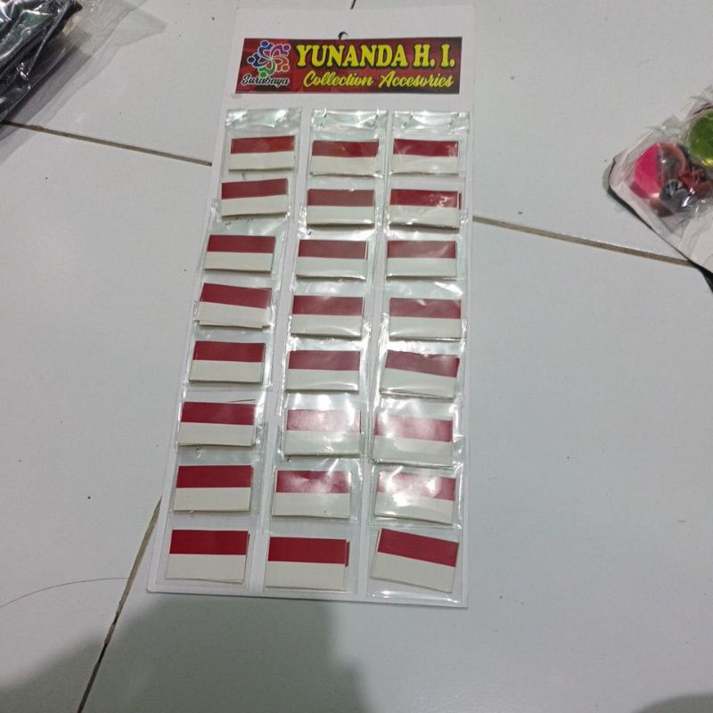 

STIKER MERAH PUTIH KEMASAN RENTENG isi 24 pack