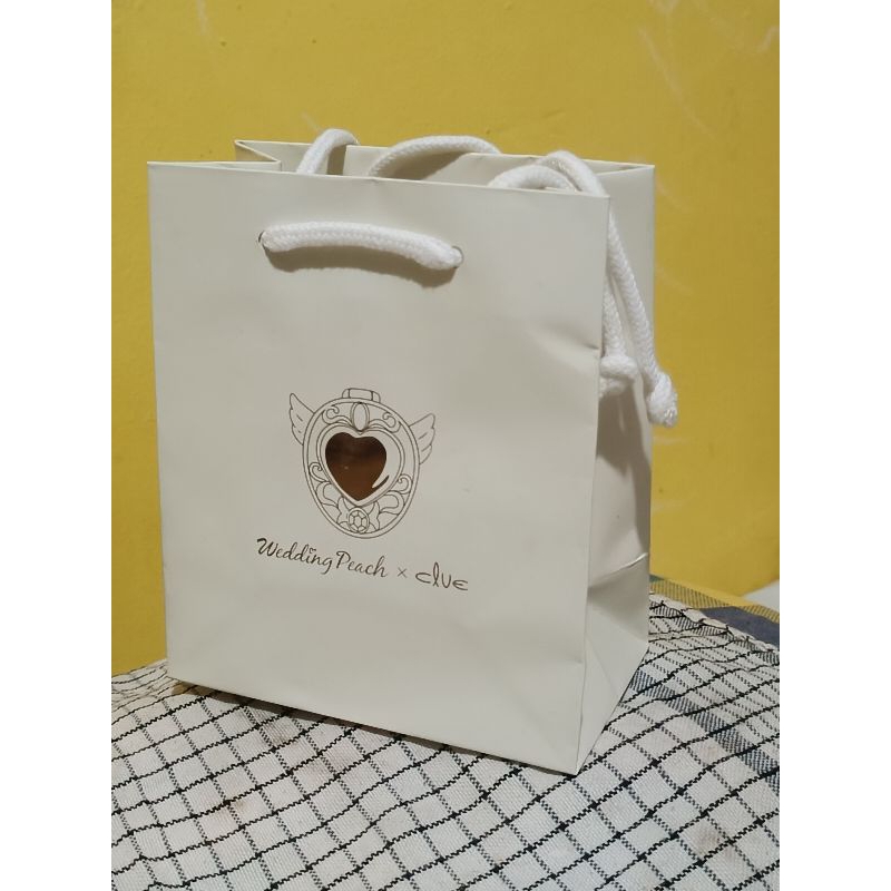 

Paper Bag Jam Tangan OFFICIAL Clue & OST (Korea Selatan) Anime 90s Wedding Peach & Cardcaptor Sakura
