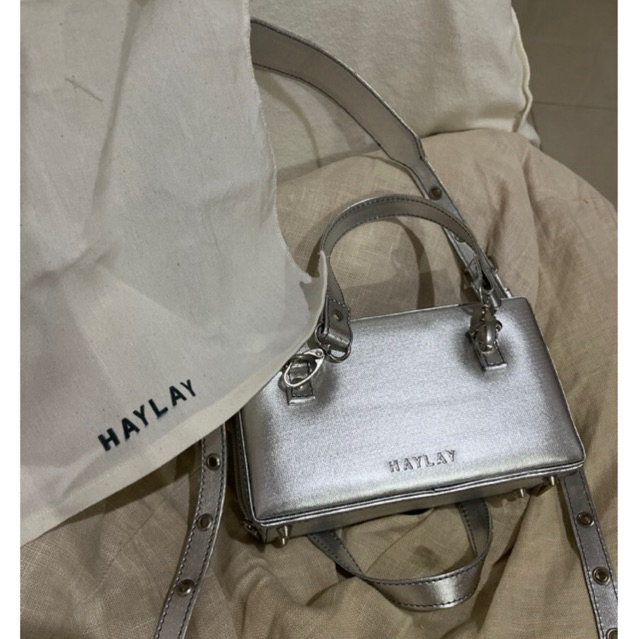preloved HAYLAY STUDIO luigi silver sling bag/shoulder bag/tas