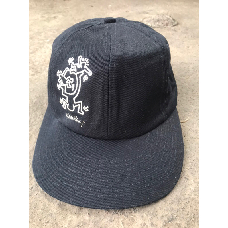 topi hitam hnm x keith haring snapback
