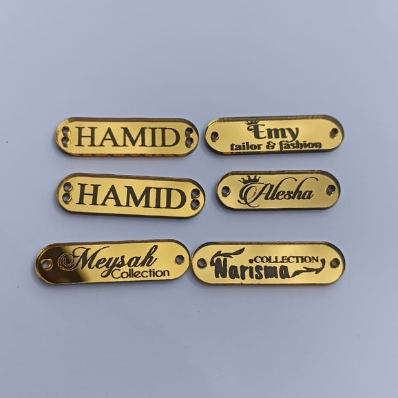 

label gold di cat hitam uk 1x4 dan 2x2