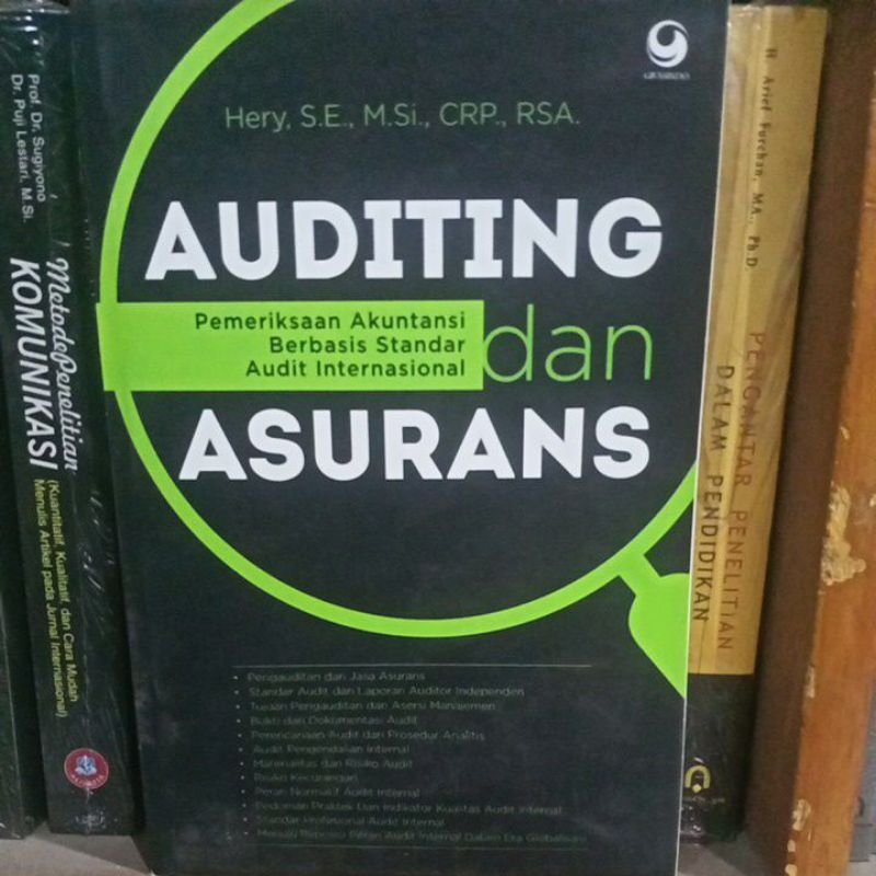 buku auditing dan asurans pemeriksaan akuntansi berbasis standar audit internasional