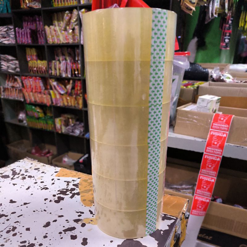 

1 Roll Takumi Tape Bening Isi 6 Pcs ( Lakban Putih ) 100 Yard Full