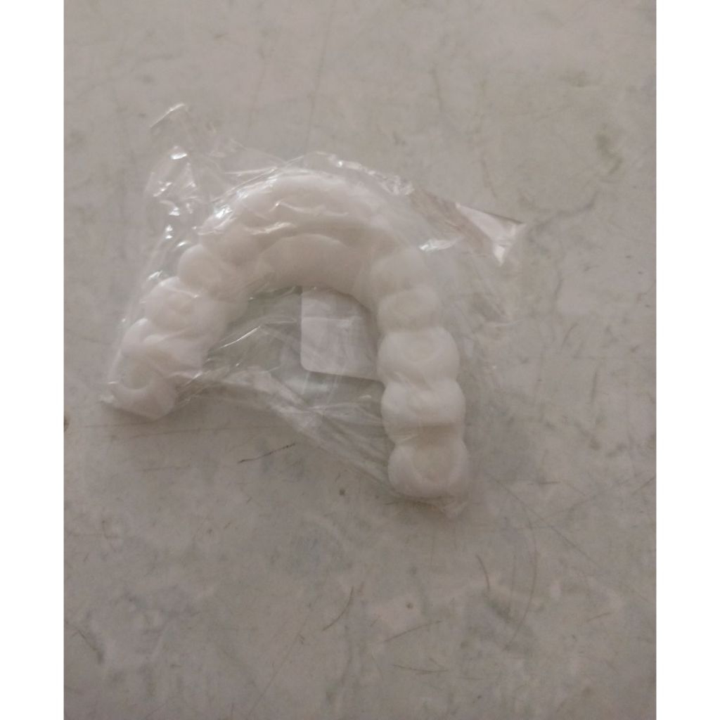 gigi palsu instan putih tempel