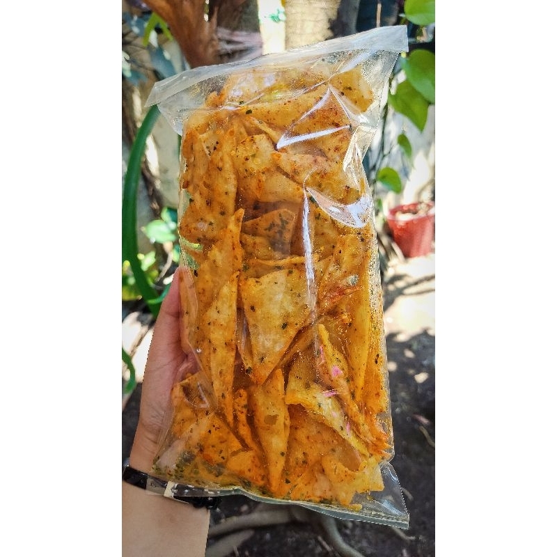 

Keripik Pangsit Segunyah (segitiga gurih renyah) Snack Teh Dewi Rasa Original/ Pedas Daun Jeruk 200g