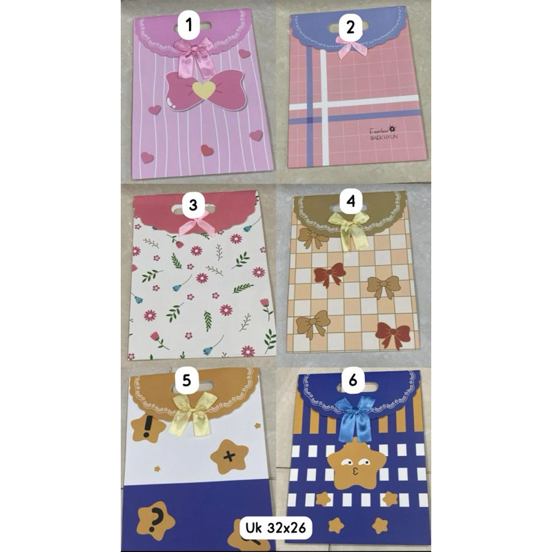 

Paper Bag Pita premium dengan penutup Untuk Kado Ukuran 32cm x 26