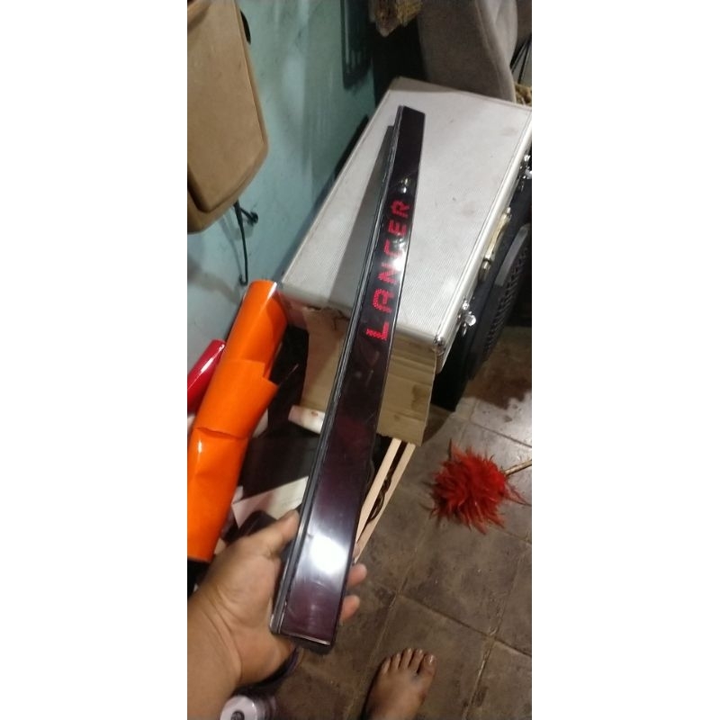 Garnish bagasi Mitsubishi lancer Dangan