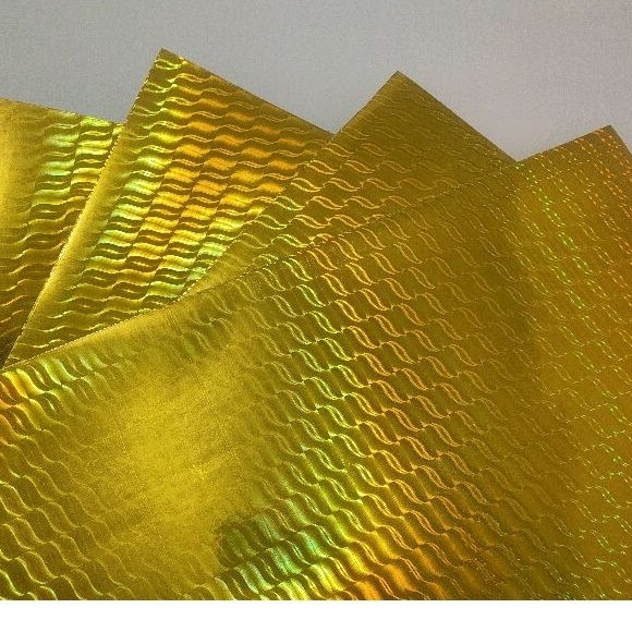 

Kertas fancy paper foil hologram, kertas emas hologram 275 gr 45 x65