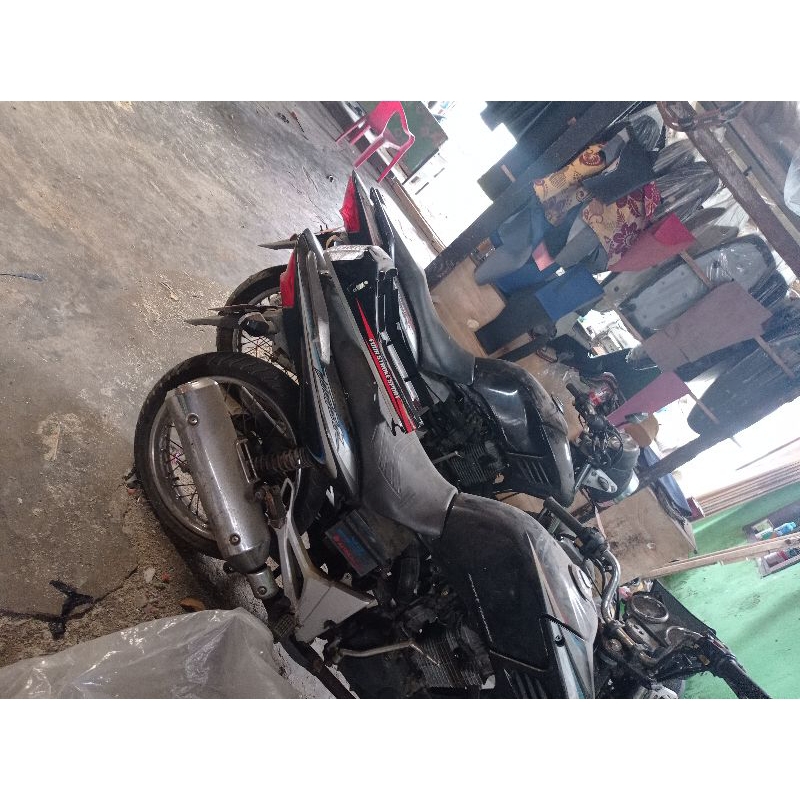 mesin Tiger Revo