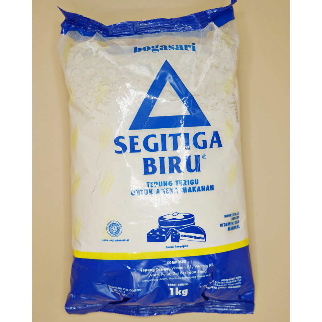 

Tepung Terigu Segitiga Biru / Bahan Kue Protein Sedang @1KG