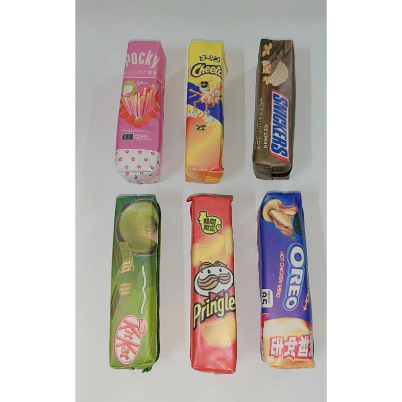 

PENCIL CASE/KOTAK PENSIL/ TEMPAT PENSIL KAIN RESLETING KECIL SNAKS SP-101